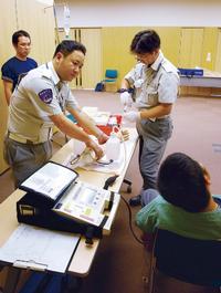 静脈路確保と輸液の投与